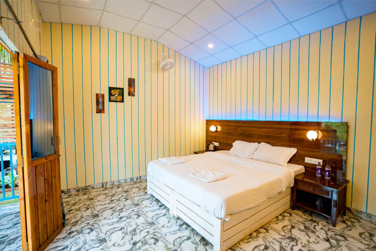 Spacious garden view room at Orange Sky Beach Resort, South Goa.