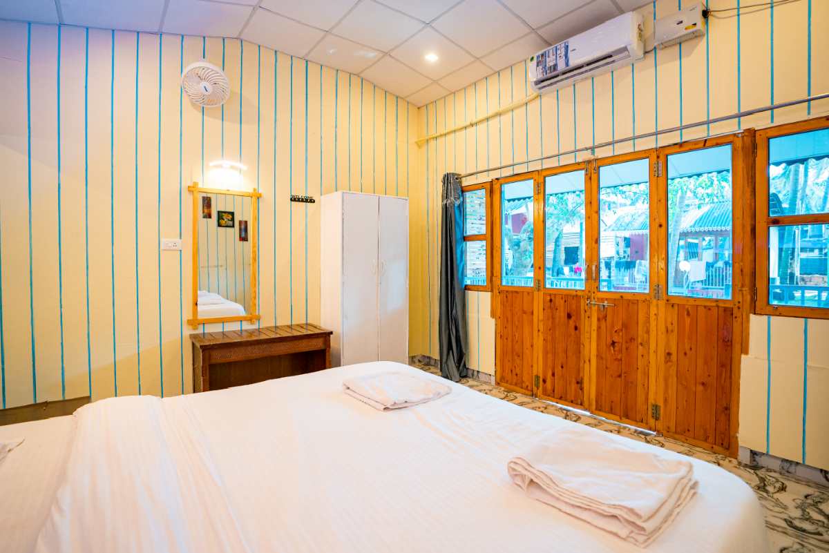 Orange Sky Beach Resort’s cozy garden view room near the beach.