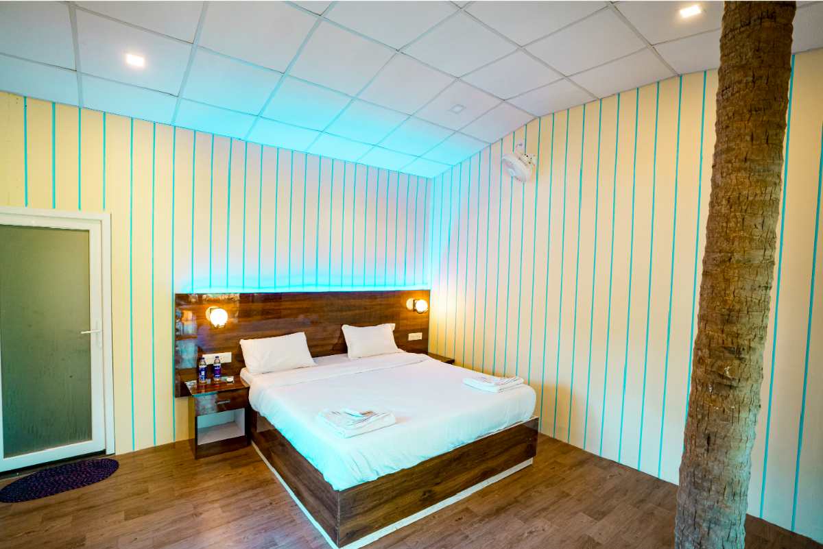 Beautiful beach facing room in South Goa with balcony view.